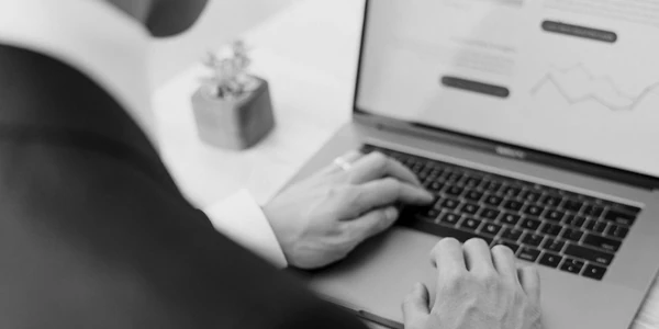 Divi-accountant-float-600x300 Typing on a laptop